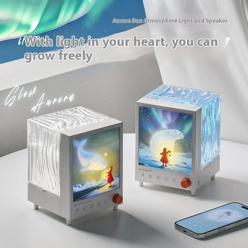 Aurora Treasure Box atmosphere projection lamp showing Star Sea Whale light effect, with compact design and Bluetooth speaker.