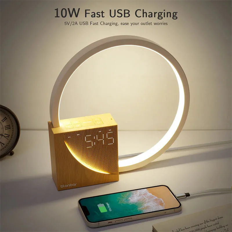 Navy blue touch control bedside lamp with digital alarm clock display on wooden table