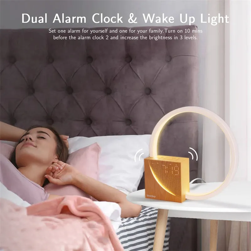 Navy blue touch control bedside lamp with digital alarm clock display on wooden table