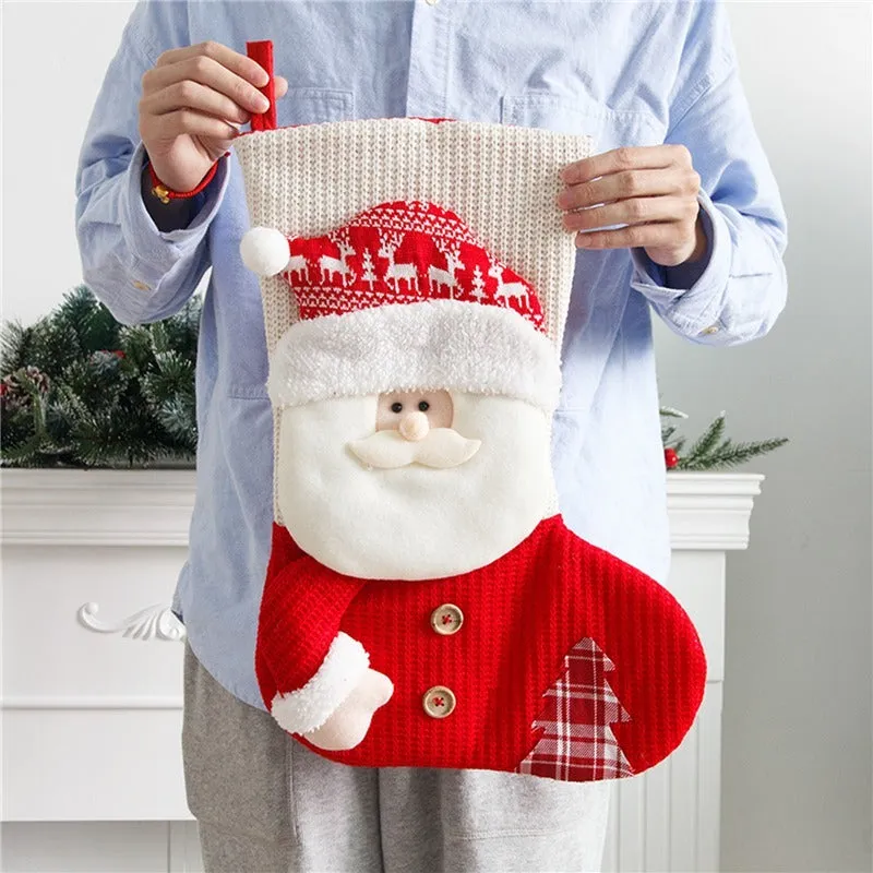 Large red and white knitted Christmas stocking with Santa Claus design hanging on fireplace