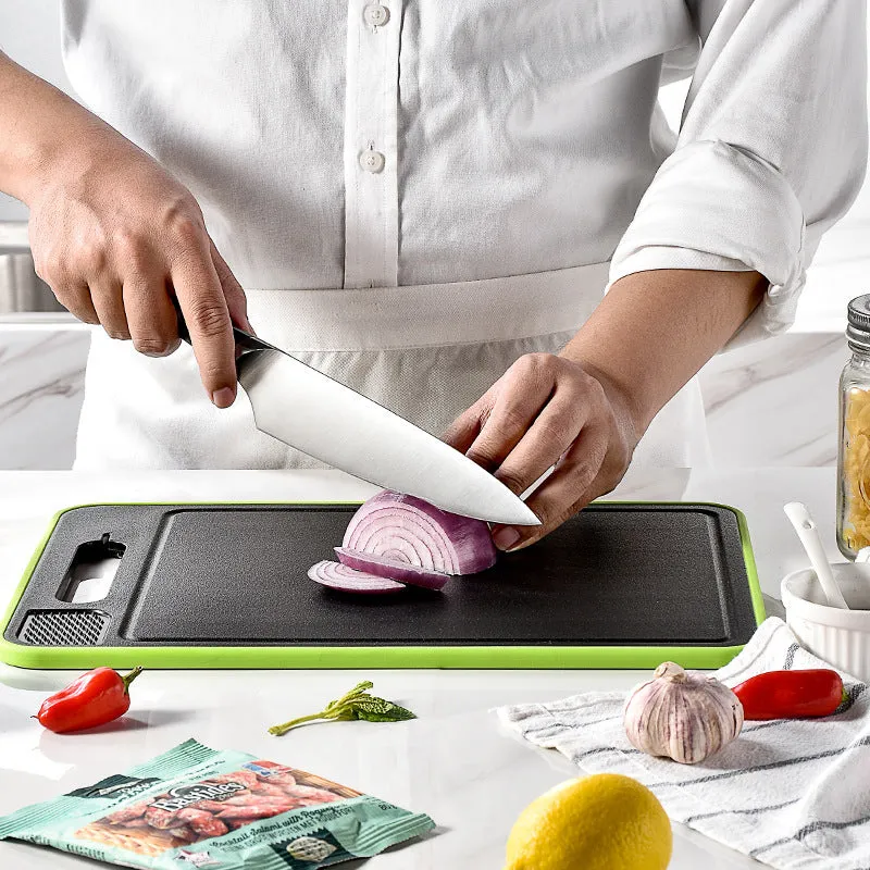 Grey square aluminium cutting board with integrated knife sharpener and grinding teeth