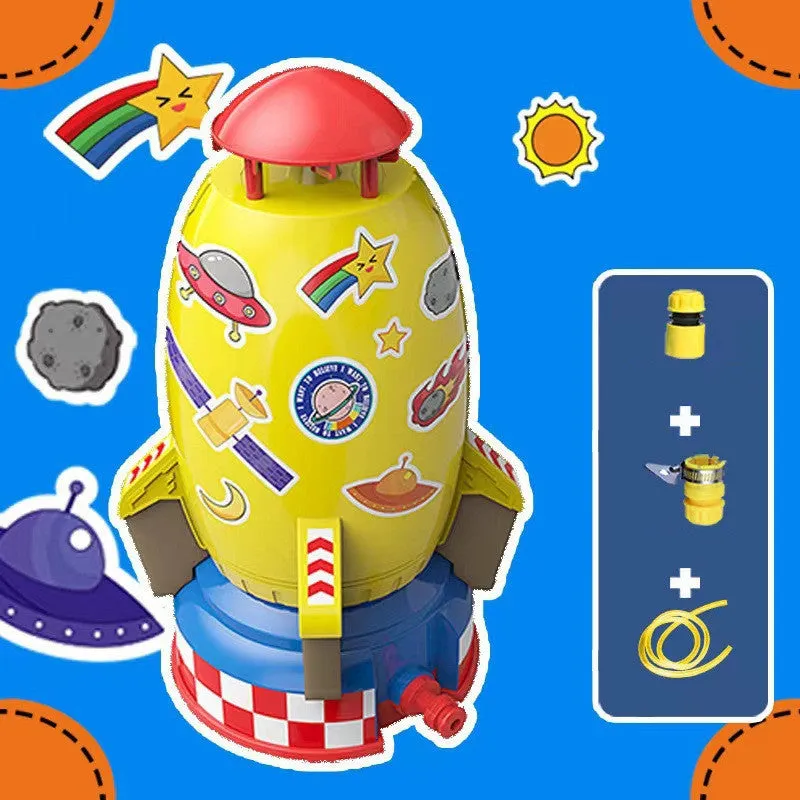 Yellow water pressure rocket launcher toy with base and interface connectors for outdoor garden play
