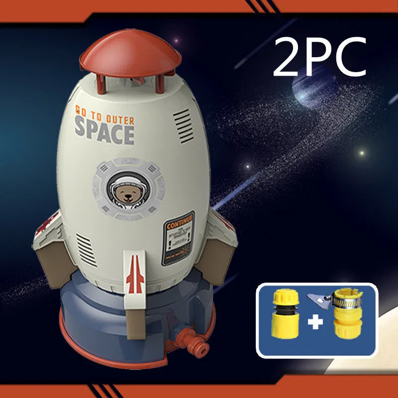 Yellow water pressure rocket launcher toy with base and interface connectors for outdoor garden play