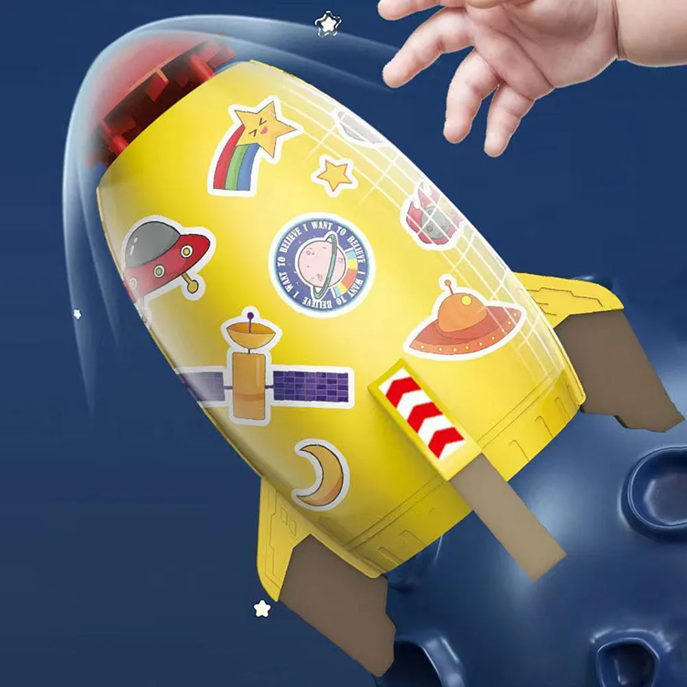 Yellow water pressure rocket launcher toy with base and interface connectors for outdoor garden play