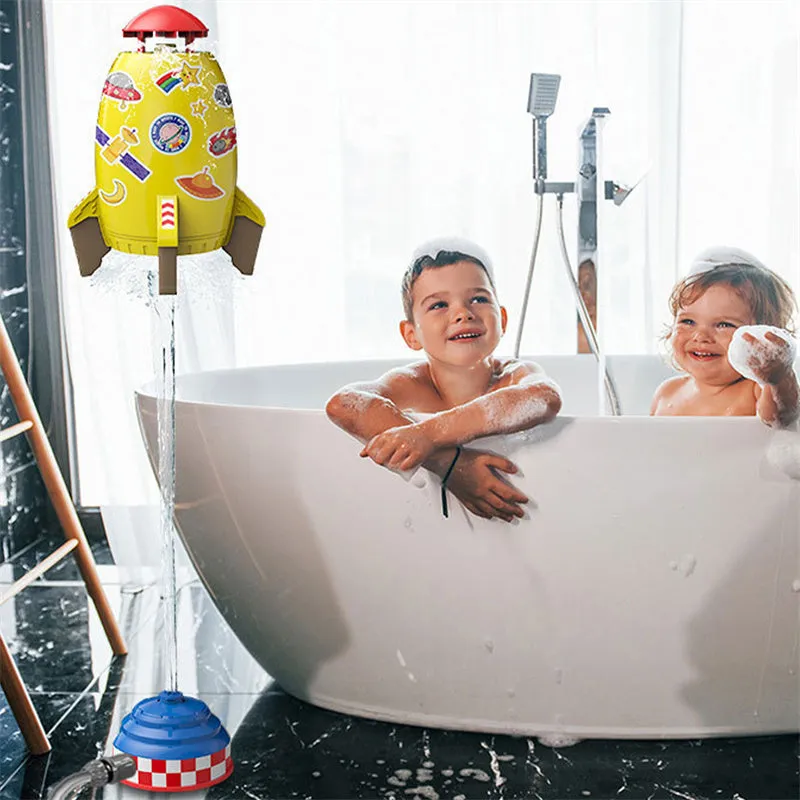 Yellow water pressure rocket launcher toy with base and interface connectors for outdoor garden play