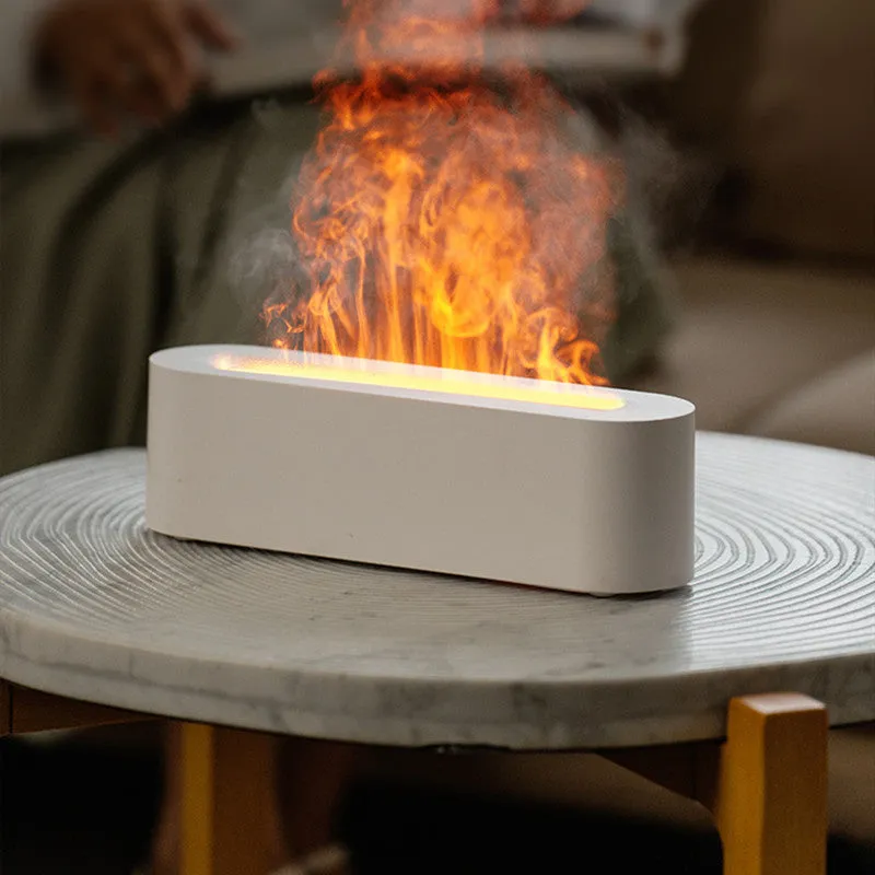 White square DQ709 ultrasonic aroma diffuser with LED flame light effect and cool mist vapour.