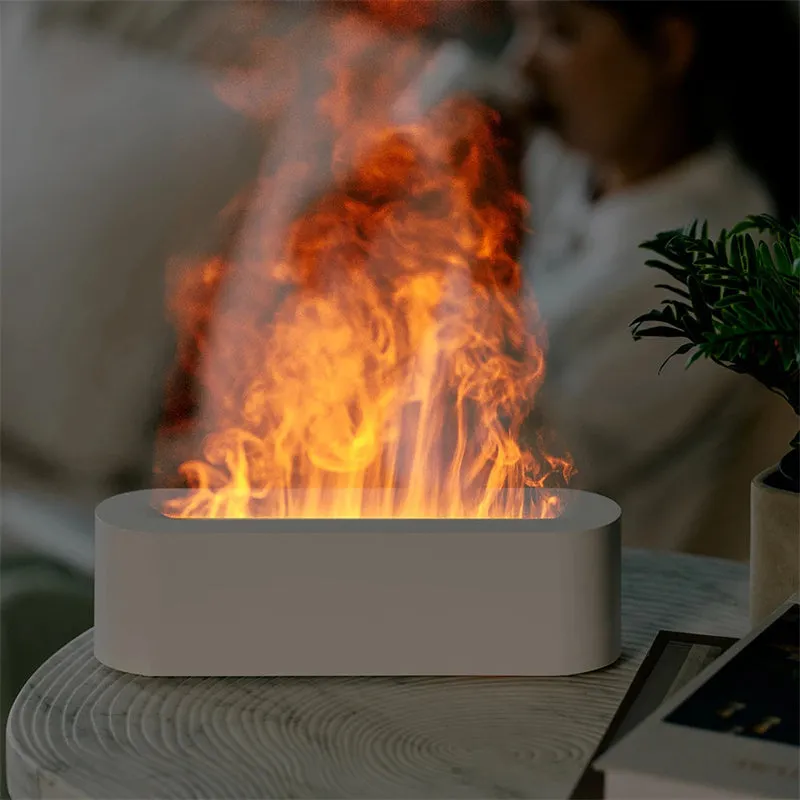 White square DQ709 ultrasonic aroma diffuser with LED flame light effect and cool mist vapour.