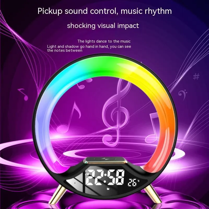 LED Colourful Music Atmosphere Clock in black, a wireless charging night light with Bluetooth speaker and digital display.