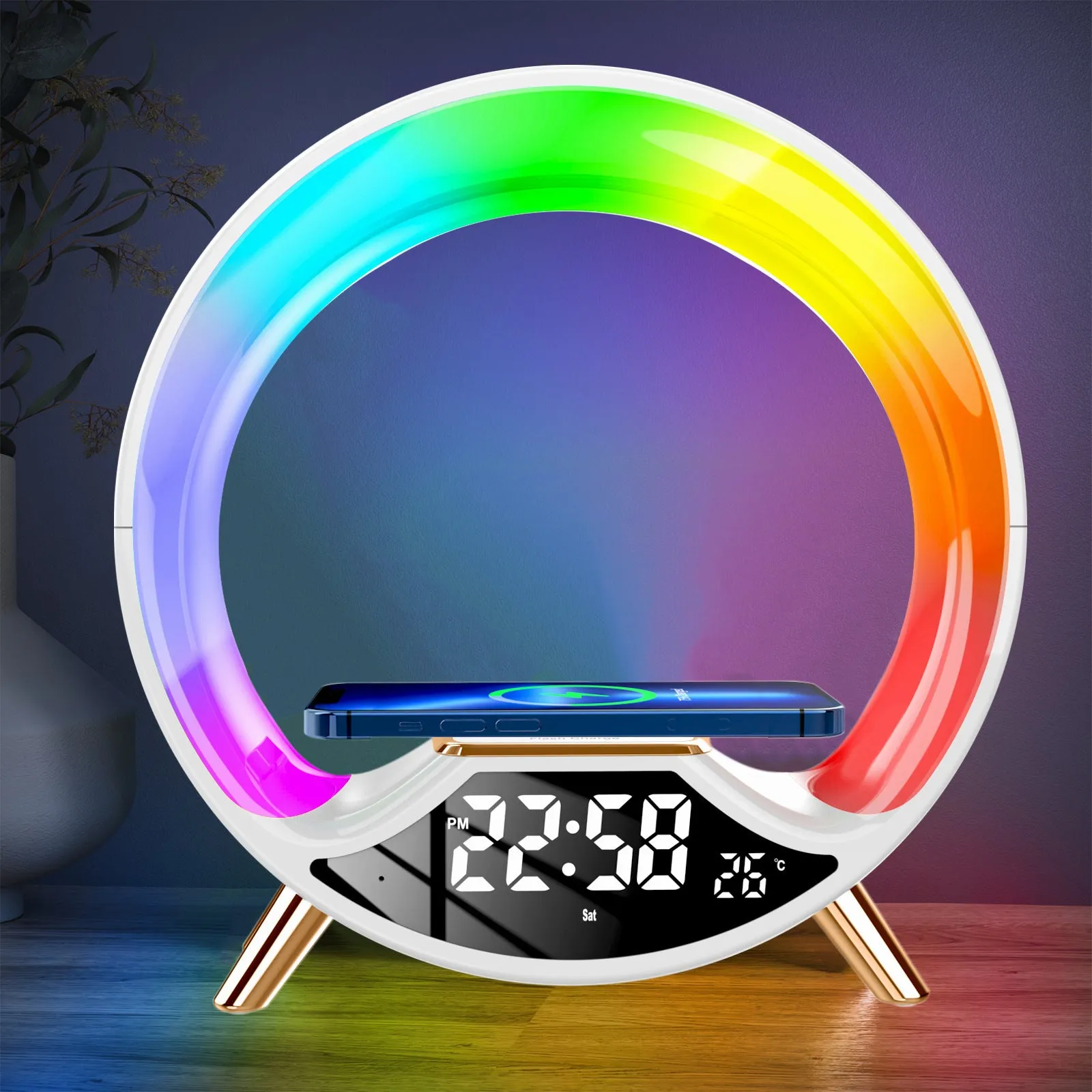 LED Colourful Music Atmosphere Clock in black, a wireless charging night light with Bluetooth speaker and digital display.