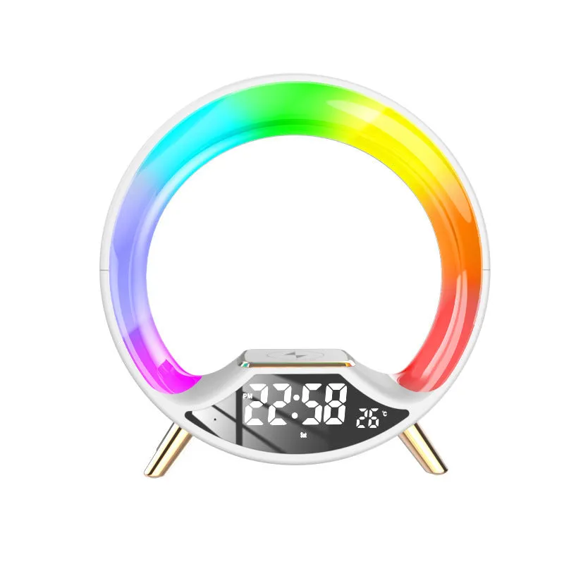 LED Colourful Music Atmosphere Clock in black, a wireless charging night light with Bluetooth speaker and digital display.