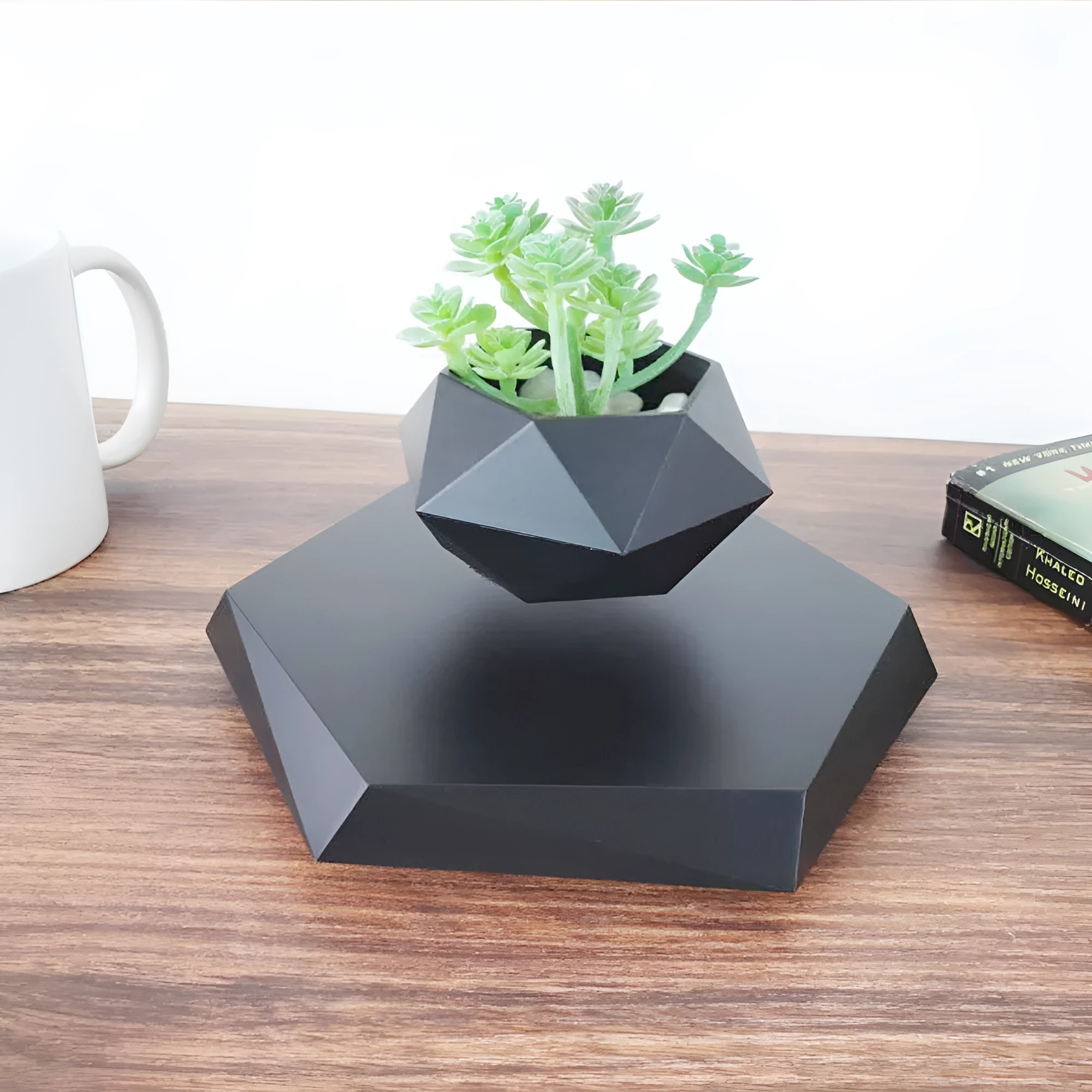 Hexagonal wood grain magnetic levitating flower pot floating above matching base