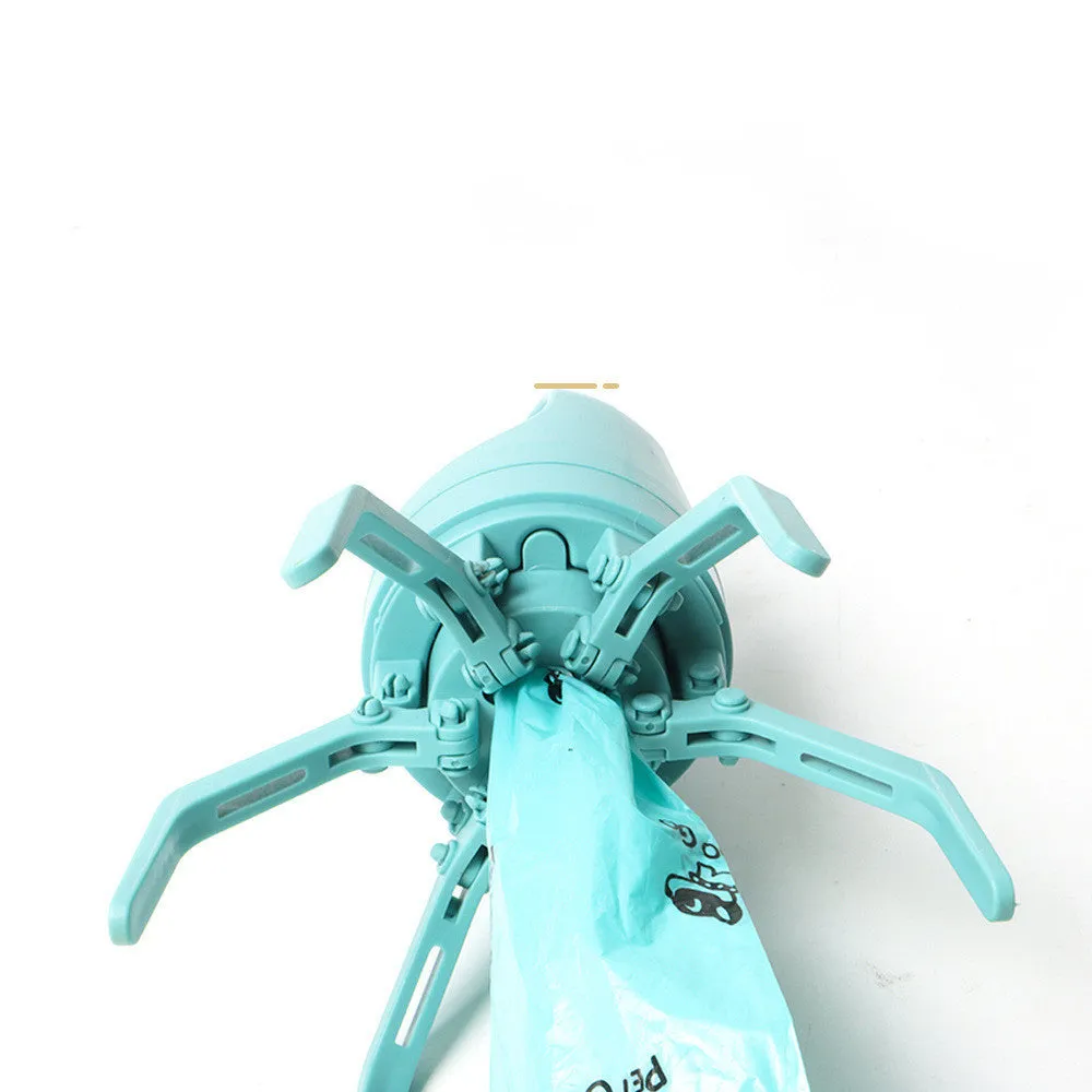 Blue portable dog pooper scooper with built-in bag dispenser and eight-claw shovel.