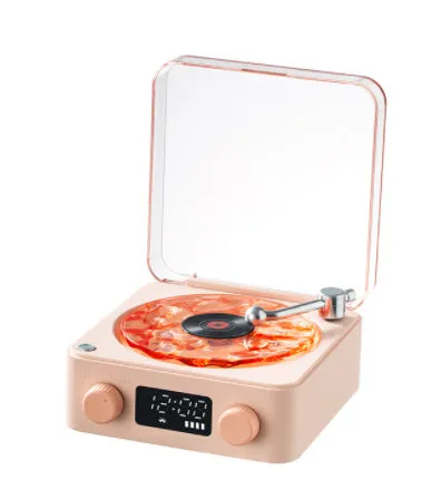 Retro turntable Bluetooth speaker with rotating vinyl and RGB projection lighting effects