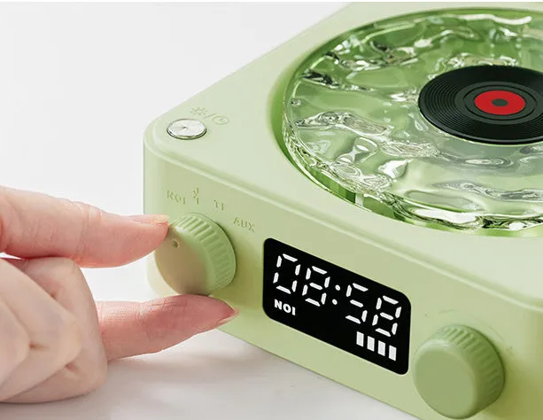 Retro turntable Bluetooth speaker with rotating vinyl and RGB projection lighting effects