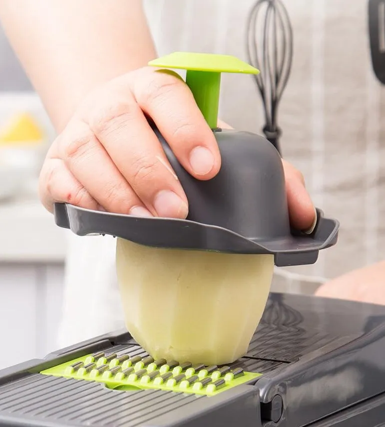 Manual vegetable cutter with multiple stainless steel blades on a wheat straw plastic body, shown in blue.