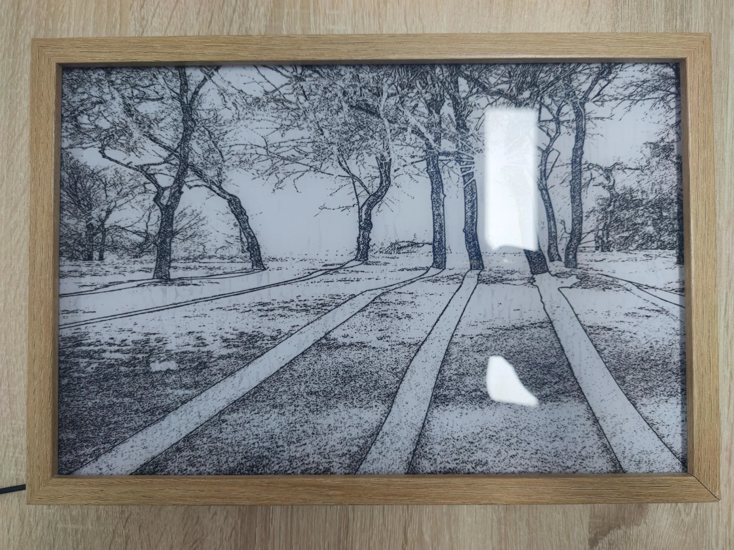 LED illuminated decorative picture showing scenic artwork with adjustable lighting in wooden frame