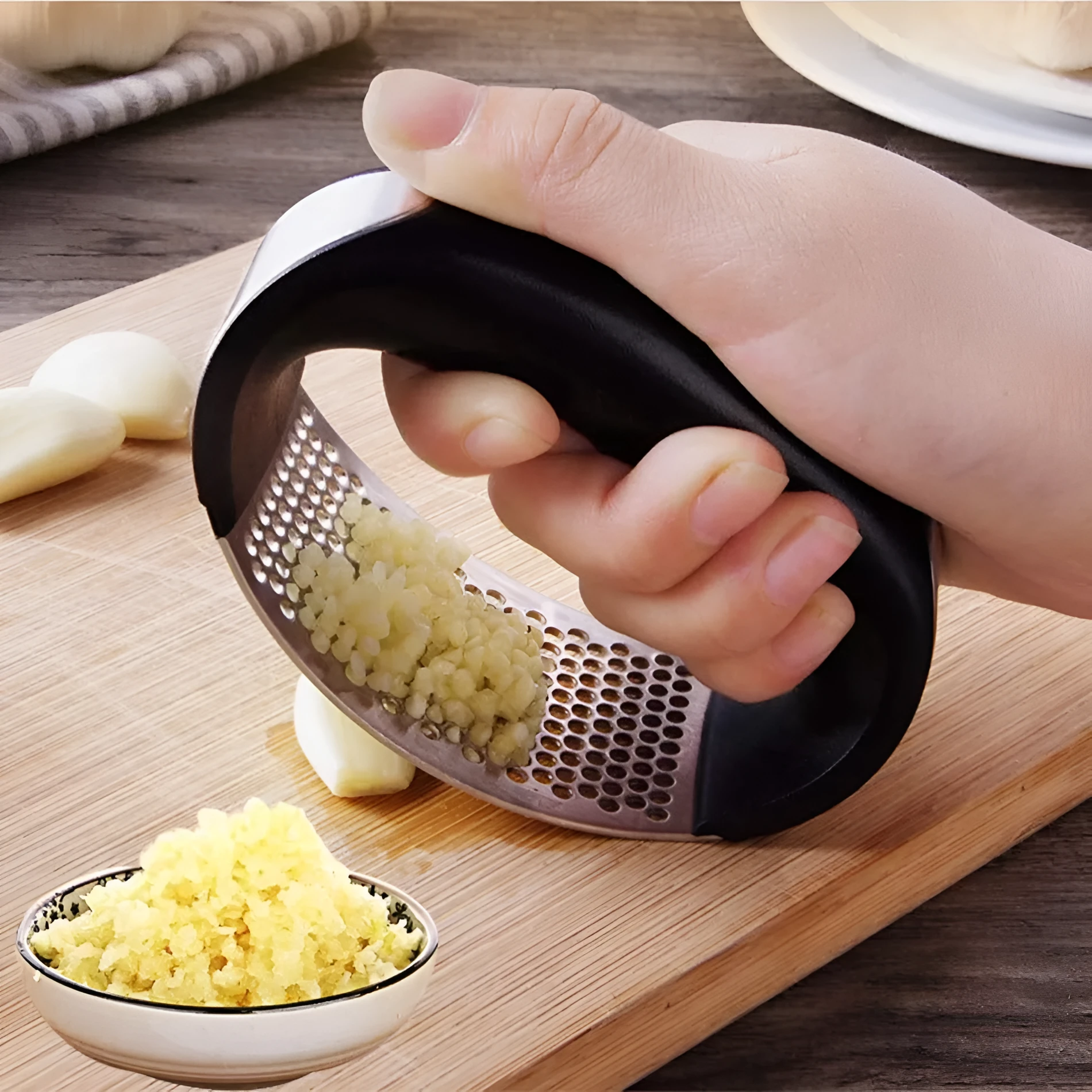 304 stainless steel garlic press with ergonomic handle in choice of colours