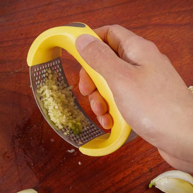 304 stainless steel garlic press with ergonomic handle in choice of colours