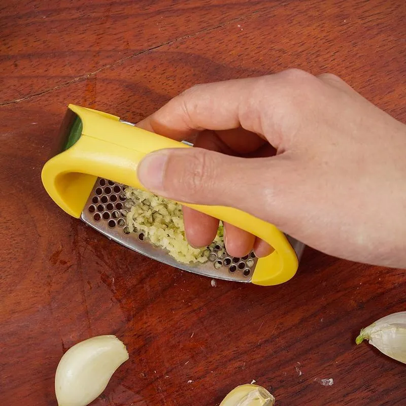 304 stainless steel garlic press with ergonomic handle in choice of colours