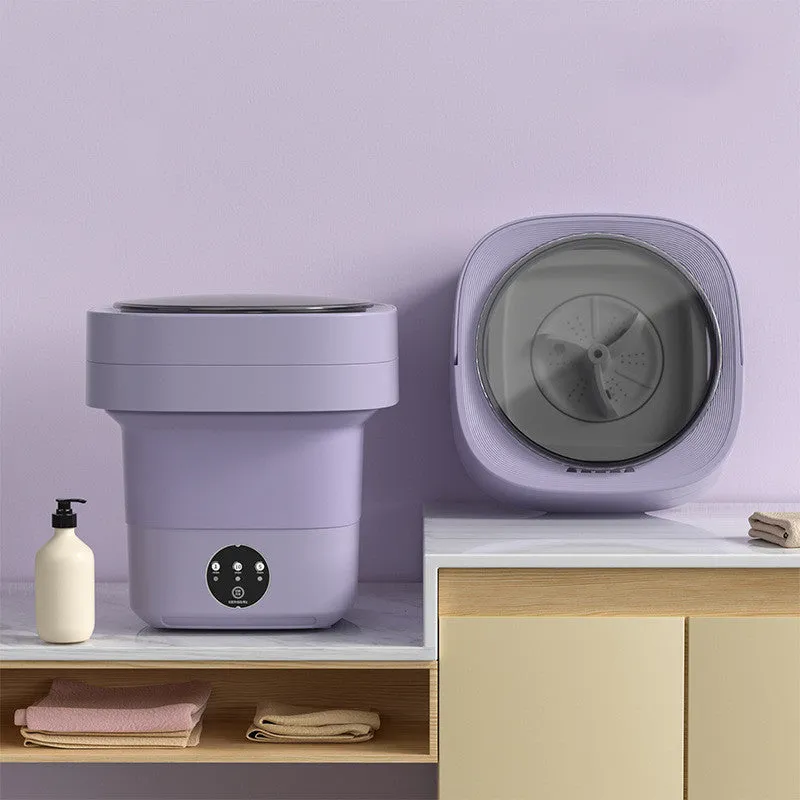 Foldable portable mini washing machine in green colour with drain pipe and basket