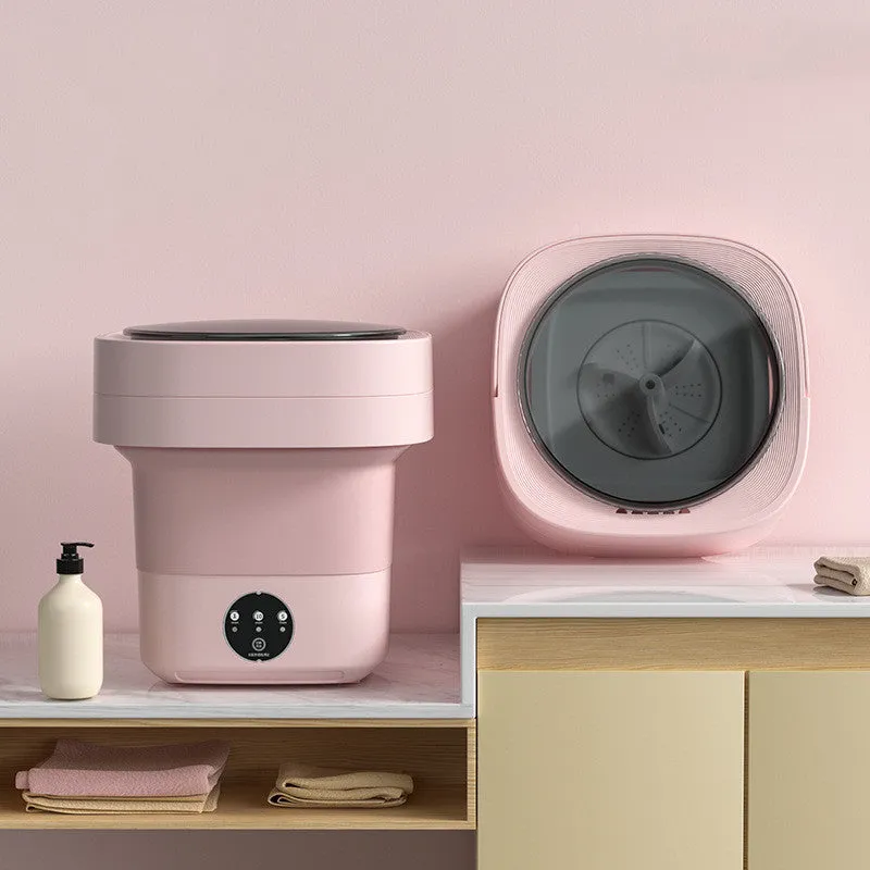 Foldable portable mini washing machine in green colour with drain pipe and basket
