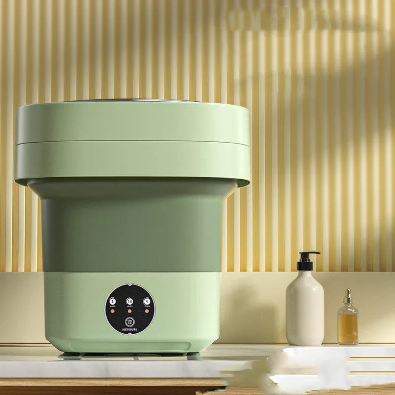 Foldable portable mini washing machine in green colour with drain pipe and basket