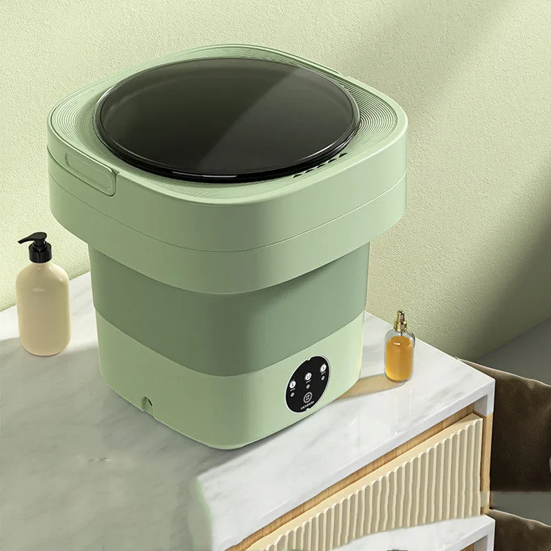 Foldable portable mini washing machine in green colour with drain pipe and basket