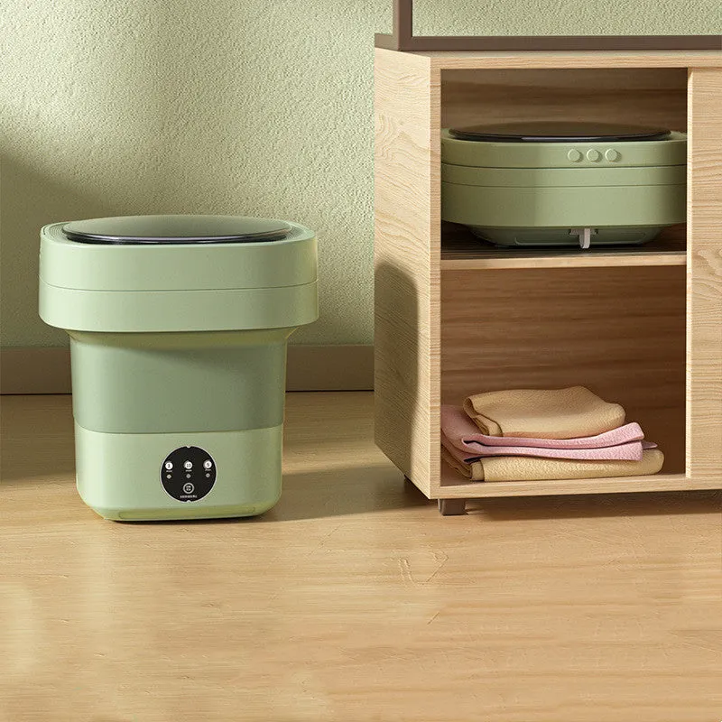 Foldable portable mini washing machine in green colour with drain pipe and basket