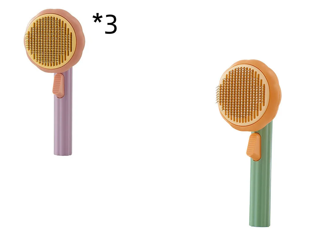 Hand-held pet grooming brush with curved stainless steel teeth in pumpkin colour option