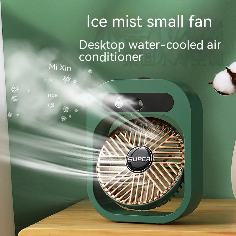 Green and white USB portable misting fan air cooler humidifier on a desk