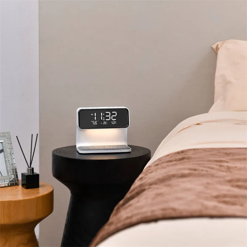 White 3-in-1 bedside table lamp with wireless charging pad, LCD screen, and touch dimmer.
