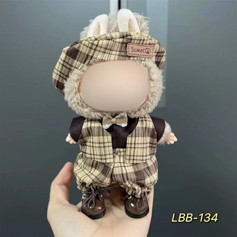 Plastic clothing costume for a 17cm tall vinyl doll figurine on display.