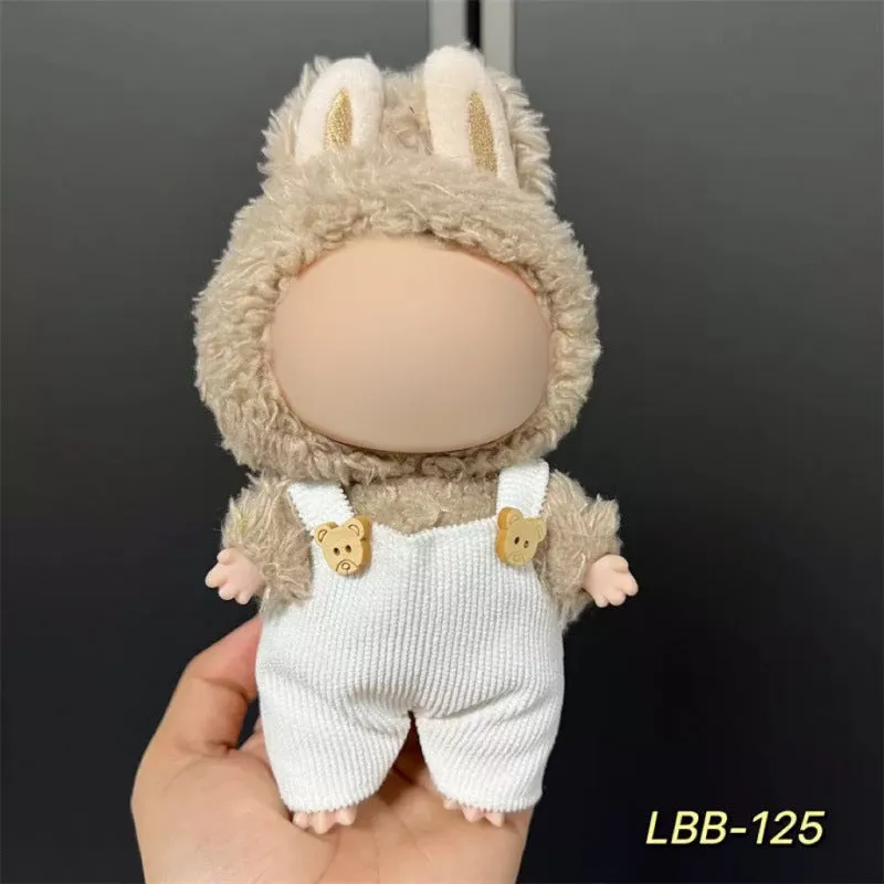 Plastic clothing costume for a 17cm tall vinyl doll figurine on display.