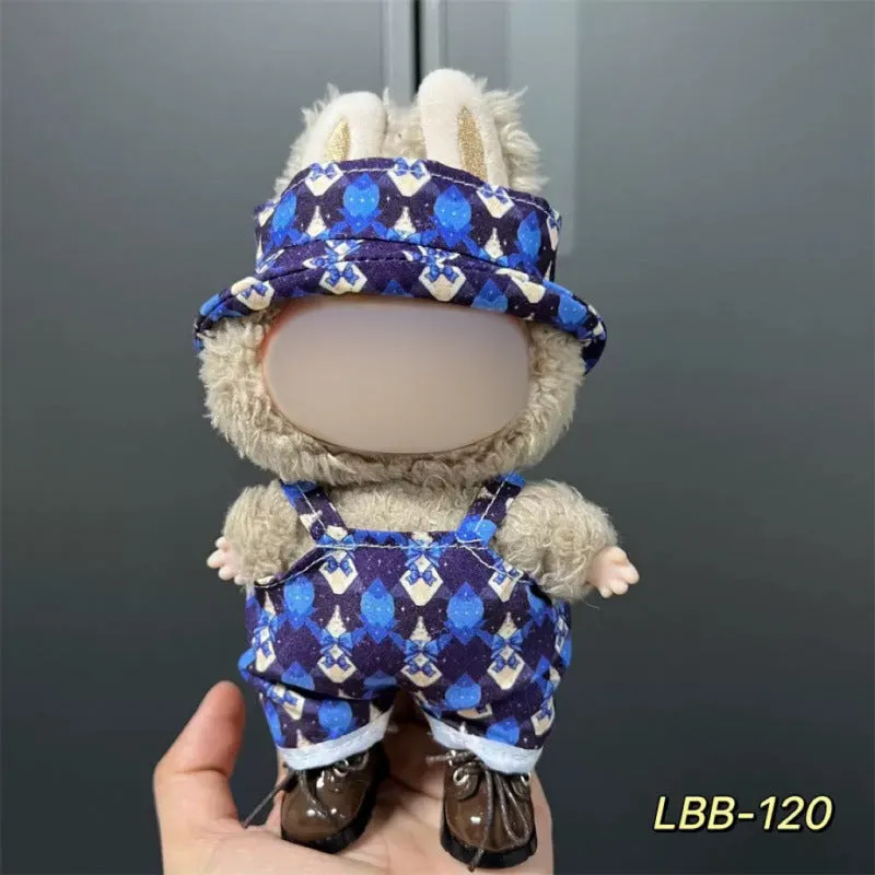Plastic clothing costume for a 17cm tall vinyl doll figurine on display.