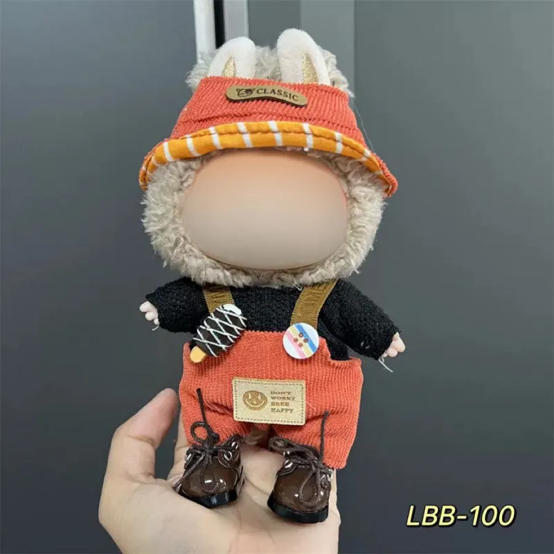Plastic clothing costume for a 17cm tall vinyl doll figurine on display.
