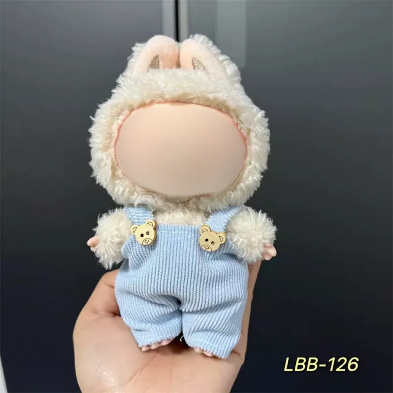 Plastic clothing costume for a 17cm tall vinyl doll figurine on display.