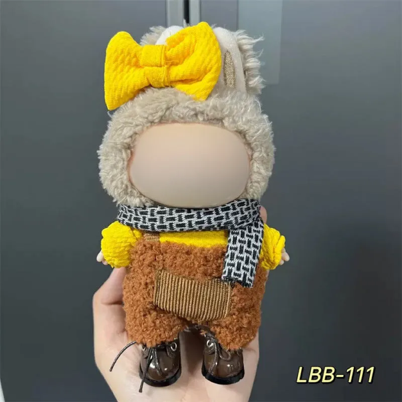 Plastic clothing costume for a 17cm tall vinyl doll figurine on display.