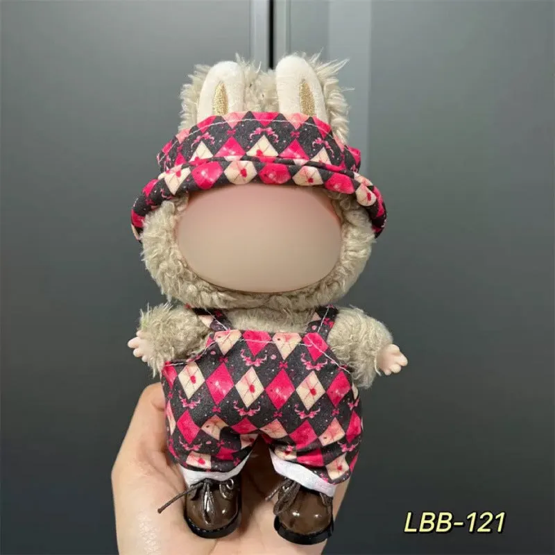 Plastic clothing costume for a 17cm tall vinyl doll figurine on display.