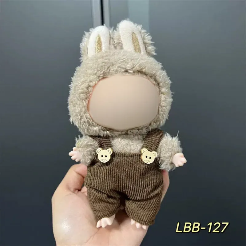 Plastic clothing costume for a 17cm tall vinyl doll figurine on display.