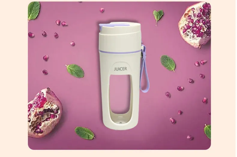 Portable USB rechargeable blender with borosilicate glass cup in fresh orange, grass green, and light purple colours.