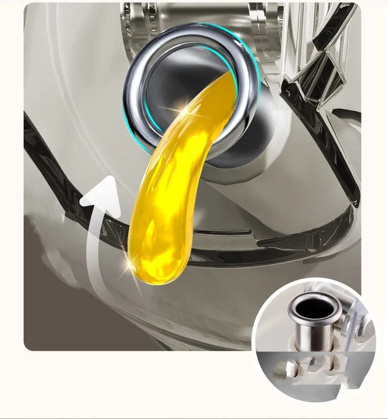 Warm grey glass 550ml oil sprayer bottle with a black spray head on a kitchen counter.