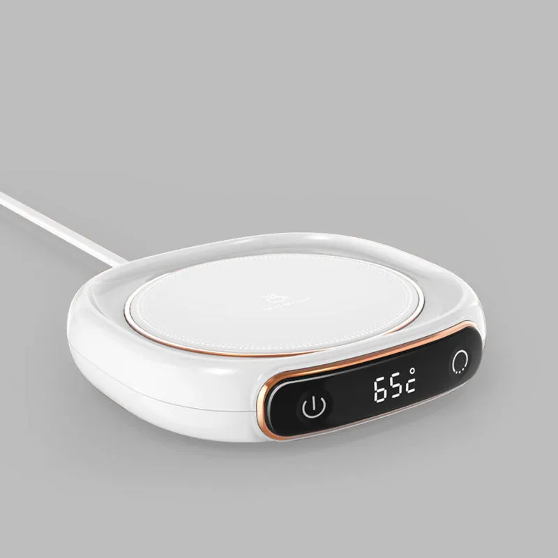 White USB-powered coffee mug warmer coaster on a wooden desk