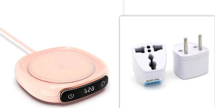 White USB-powered coffee mug warmer coaster on a wooden desk