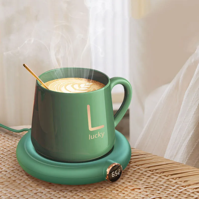 White USB-powered coffee mug warmer coaster on a wooden desk