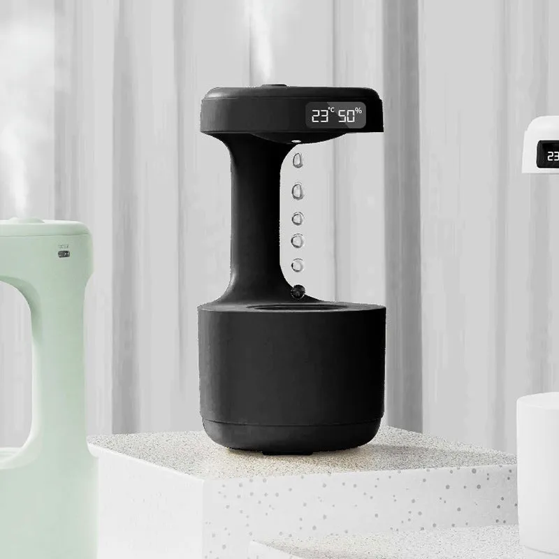 White columnar anti-gravity humidifier with LED clock display and water droplet backflow feature