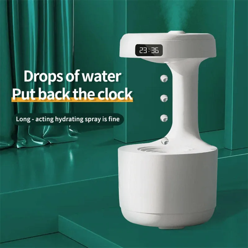White columnar anti-gravity humidifier with LED clock display and water droplet backflow feature