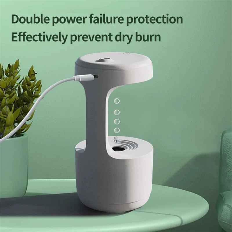 White columnar anti-gravity humidifier with LED clock display and water droplet backflow feature