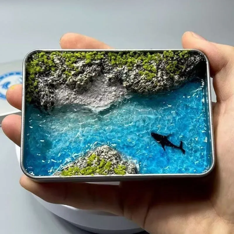 DIY bamboo handmade marine landscape model ornament for aquariums on a table.