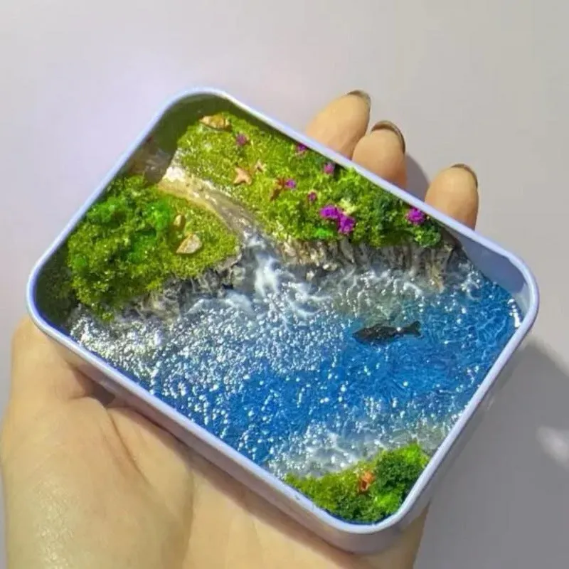 DIY bamboo handmade marine landscape model ornament for aquariums on a table.