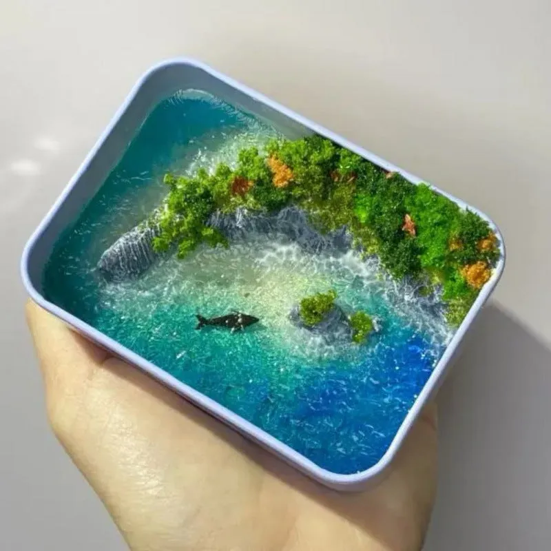 DIY bamboo handmade marine landscape model ornament for aquariums on a table.